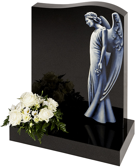Headstone with engraved angel