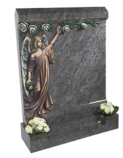 Headstone with angel and flowers